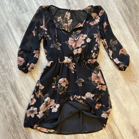 Pretty floral dress. Sheer with tank liner. Tassel details. Elastic waistband. - Picture 2 of 13